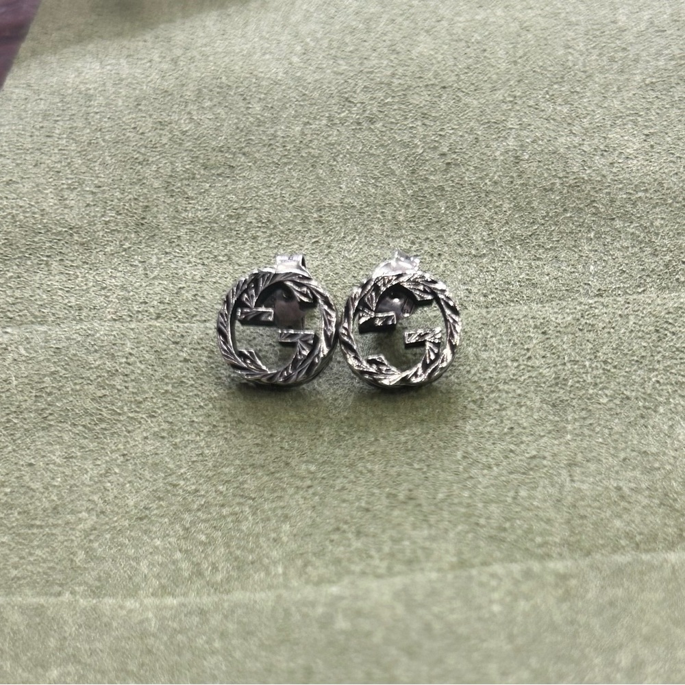 Gucci Interlocking G Twisted Silver Earrings - image 1